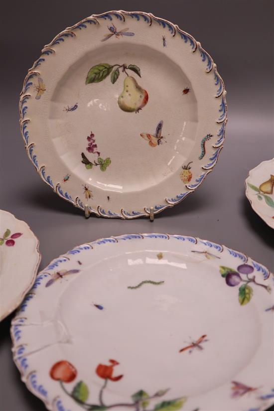 Four Chelsea fruit-painted plates c1755-60, one red anchor, two with brown anchor mark